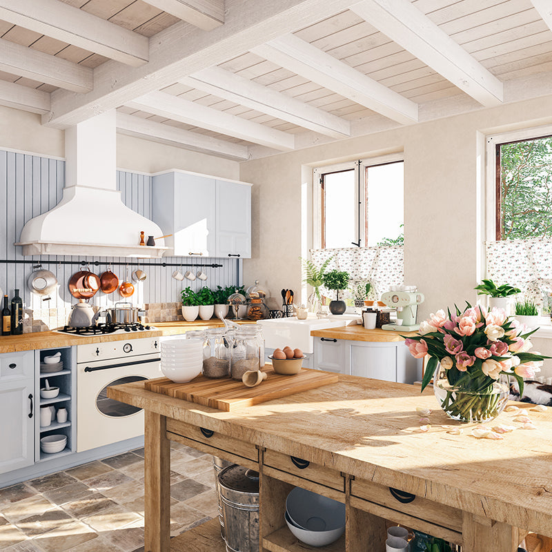 a brightly lit kitchen with placid cottage style decor, featuring Amerelle Wallplates