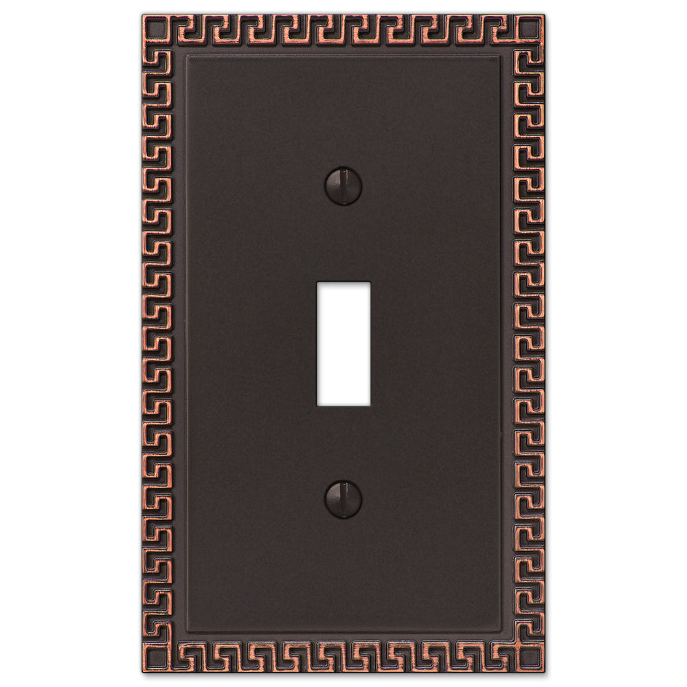 A Greek Key aged bronze light switch cover showcasing an intricate geometric border design with a rich, dark bronze finish, adding a touch of timeless elegance and classical style to any room.