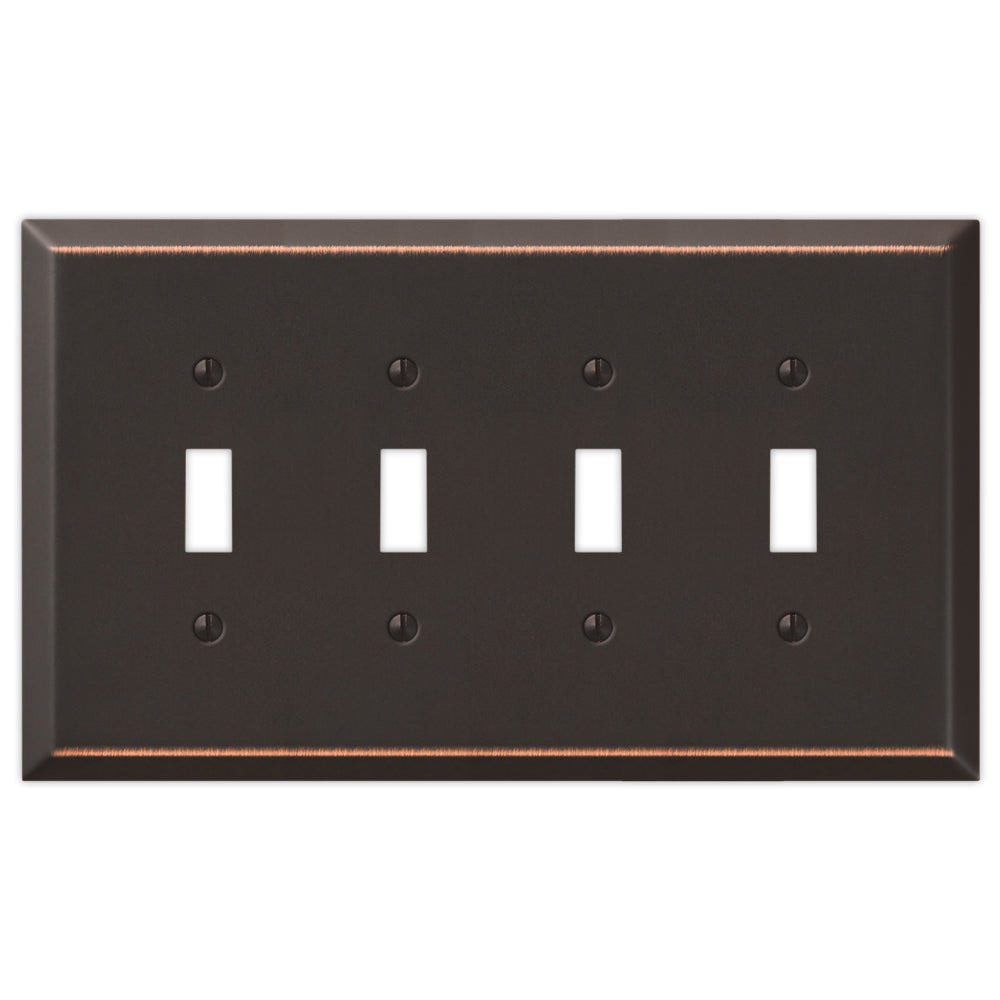 An oversized quadruple light switch cover made of aged bronze, featuring a textured, weathered surface with a rich, vintage patina, adding a timeless, antique feel to the switch.