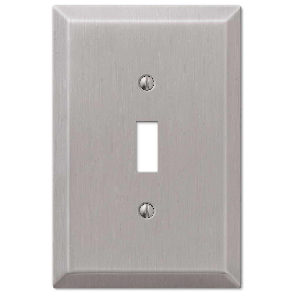 An oversized brushed nickel light switch cover, showcasing a sleek, matte finish with a subtle, satin sheen, offering a modern and refined look to the switch.