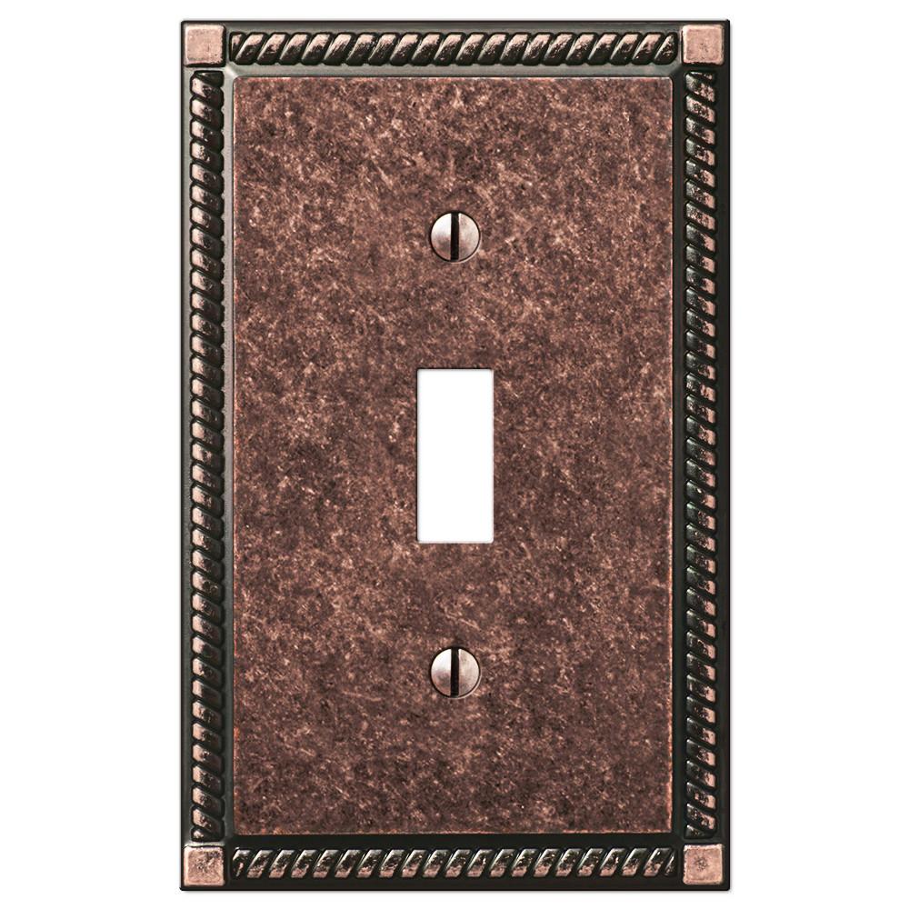 Georgian tumbled aged bronze light switch cover featuring a classic design with a rich, textured bronze finish, adding a touch of timeless elegance and rustic charm to your décor.