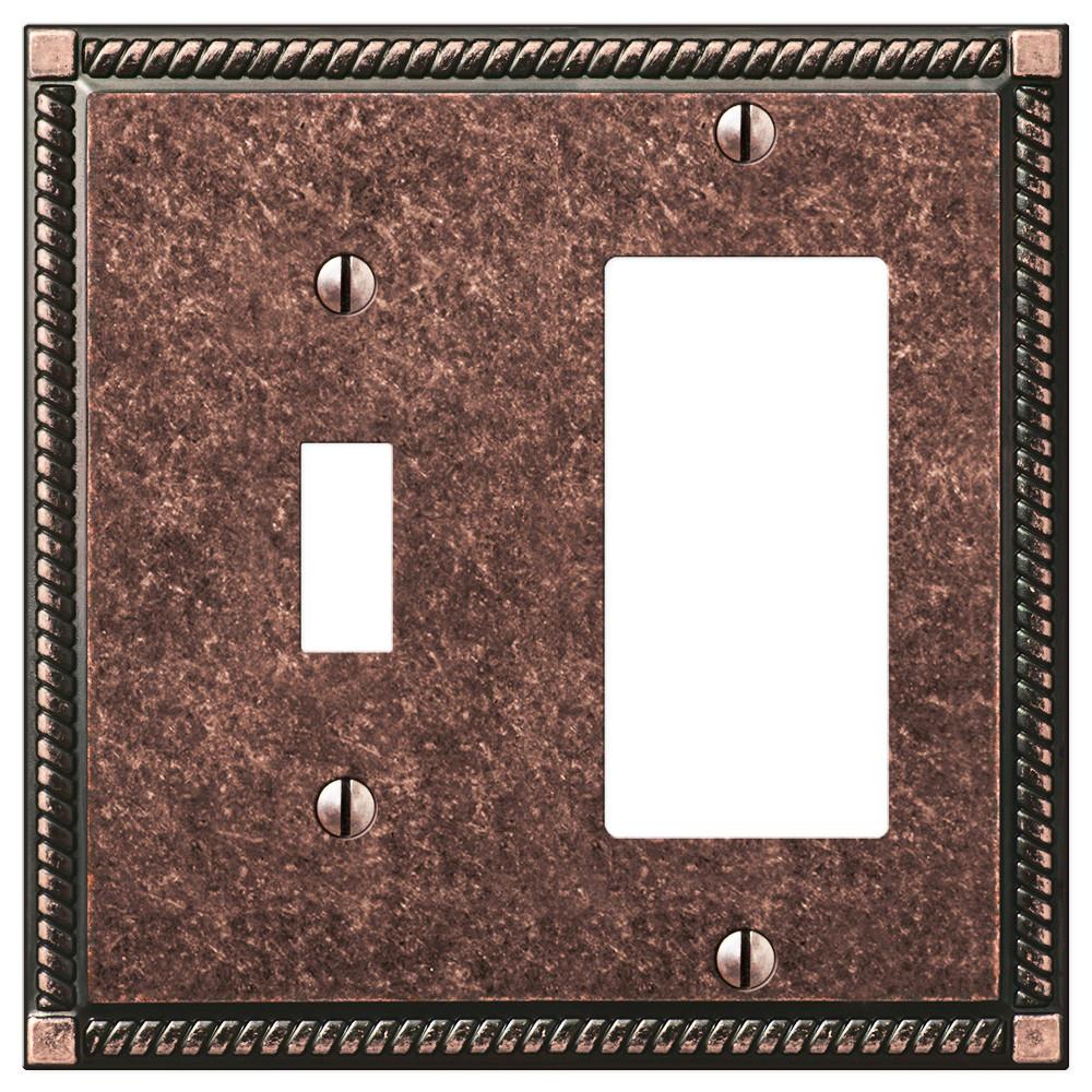 Georgian tumbled aged bronze light switch and dimmer wallplate featuring a classic design with a rich, textured bronze finish, adding a touch of timeless elegance and rustic charm to your décor.