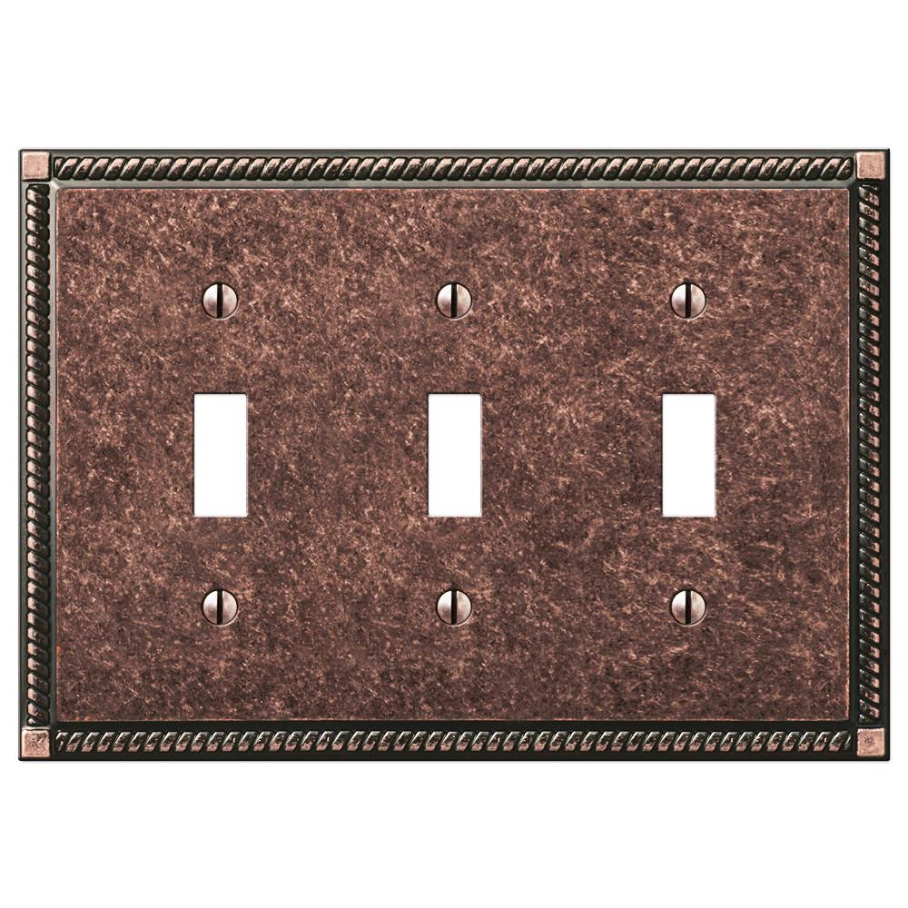 Georgian tumbled aged bronze triple light switch cover featuring a classic design with a rich, textured bronze finish, adding a touch of timeless elegance and rustic charm to your décor.