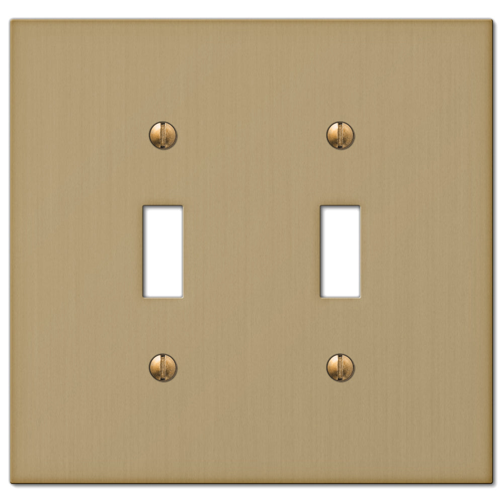 A brushed bronze double light switch cover from the Elan collection, showcasing a warm, satin finish with soft highlights that emphasize its sophisticated design. The gently brushed texture lends a subtle depth, while its timeless style exudes understated elegance.
