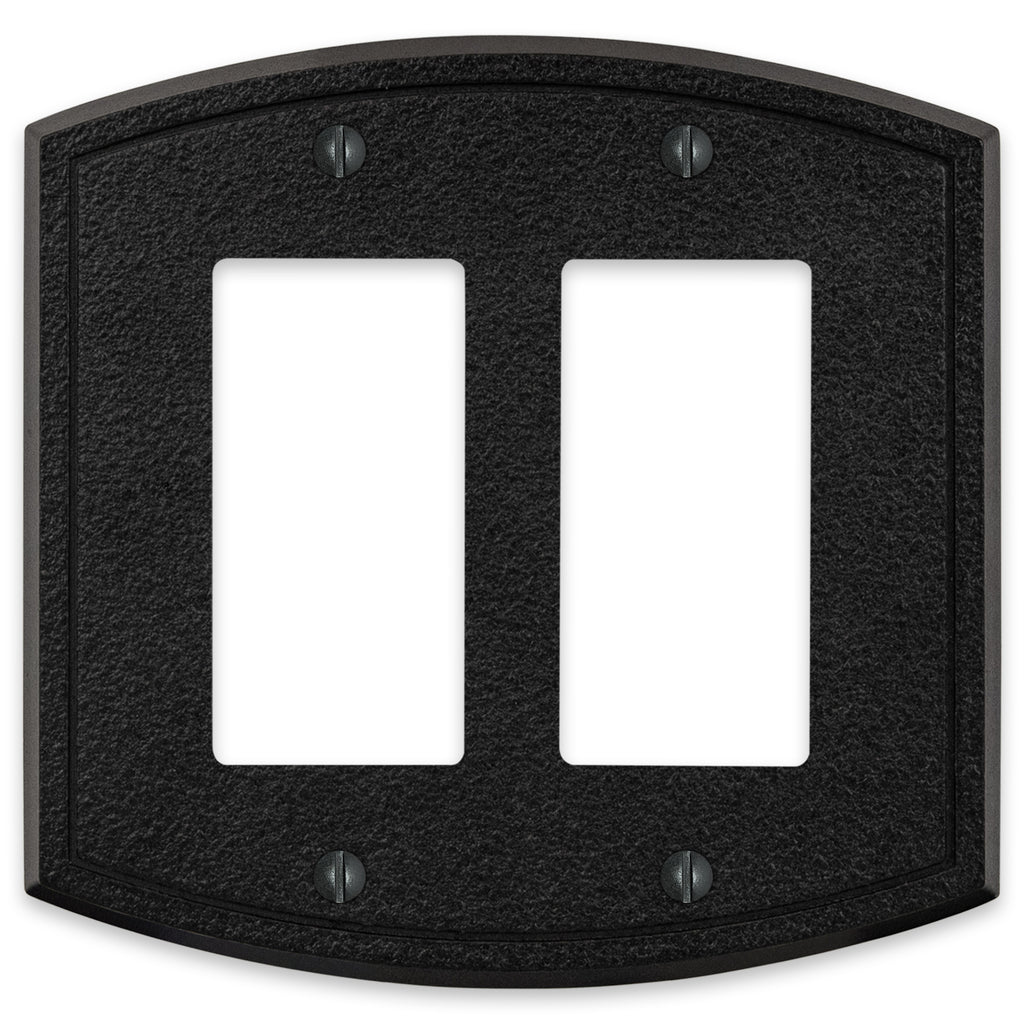 Black iron double dimmer wallplate with a rugged, textured surface and a sturdy, industrial design, bringing a bold, rustic accent to the room.