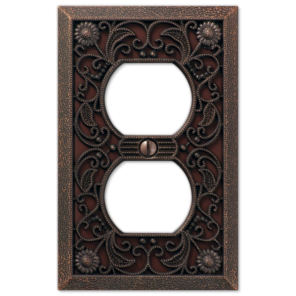 Filigree aged bronze outlet wallplate with an intricate, decorative design and a rich bronze finish, evoking a vintage charm and adding a touch of timeless elegance to any space.