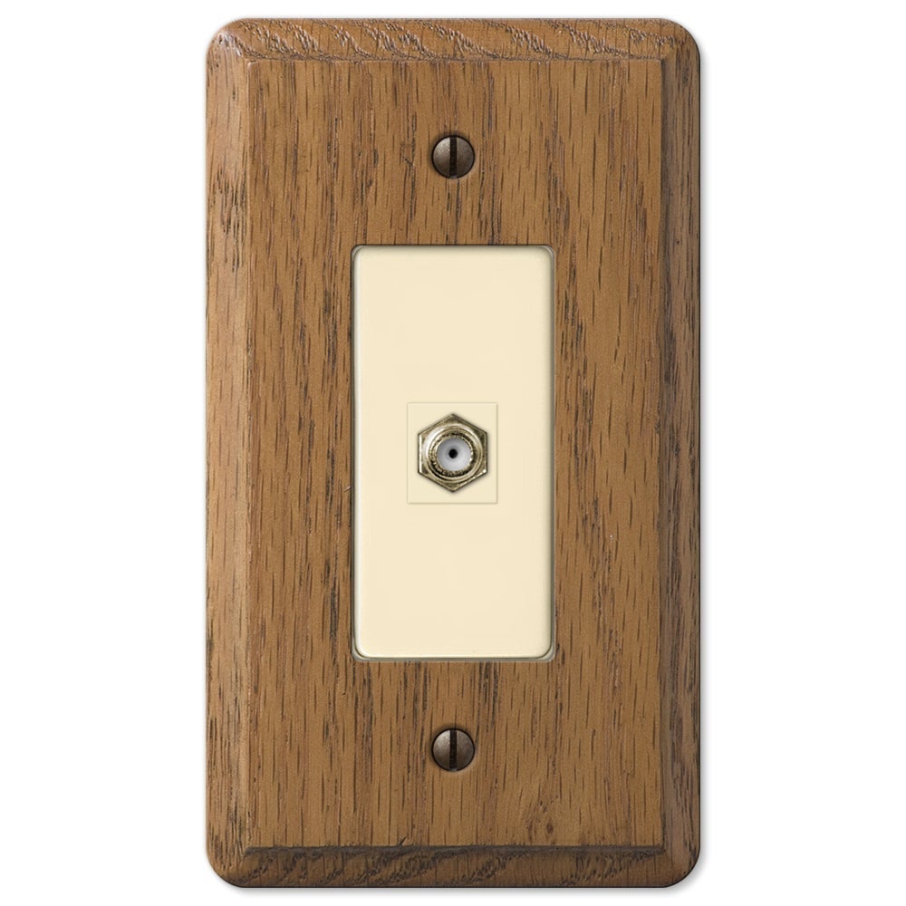 medium oak cable access wallplate featuring a rich, natural wood grain finish in a warm, medium-brown tone. The smooth surface and distinct texture bring a sense of warmth and sophistication, making it a versatile choice for both traditional and rustic interiors