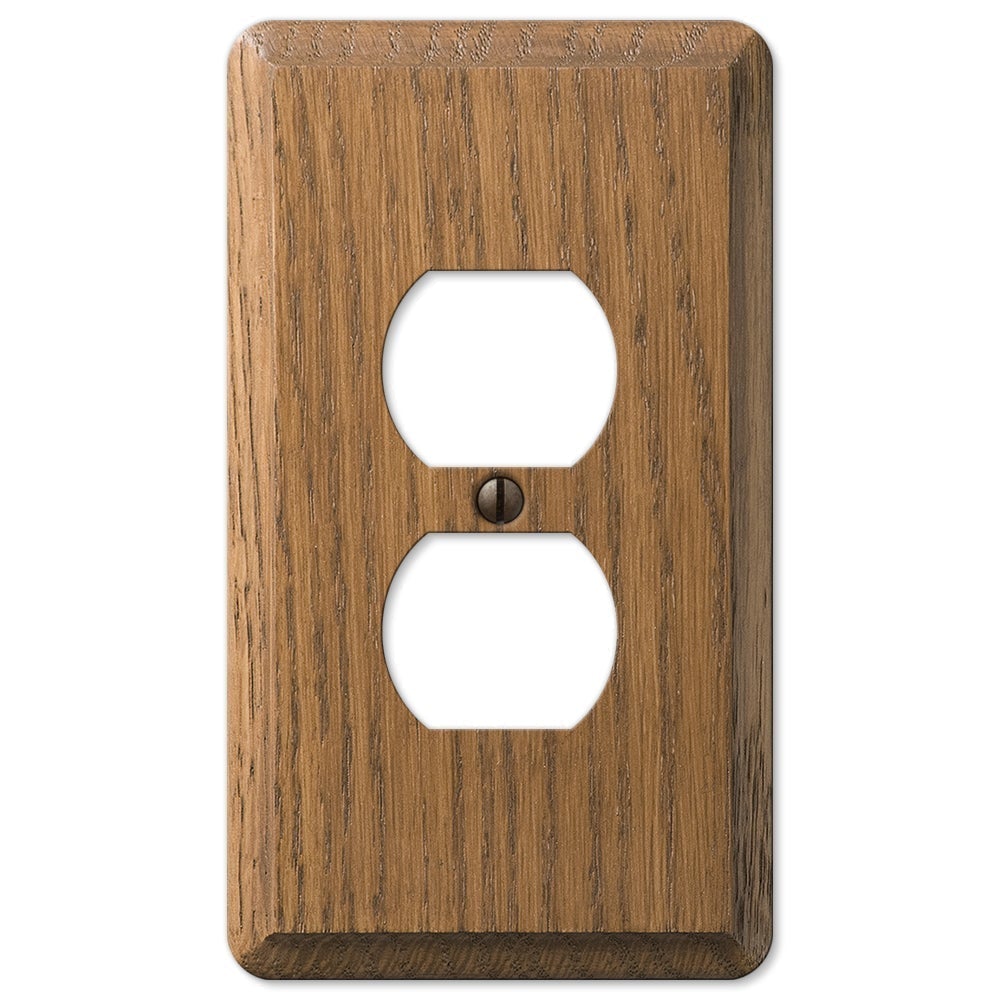 medium oak outlet wallplate featuring a rich, natural wood grain finish in a warm, medium-brown tone. The smooth surface and distinct texture bring a sense of warmth and sophistication, making it a versatile choice for both traditional and rustic interiors