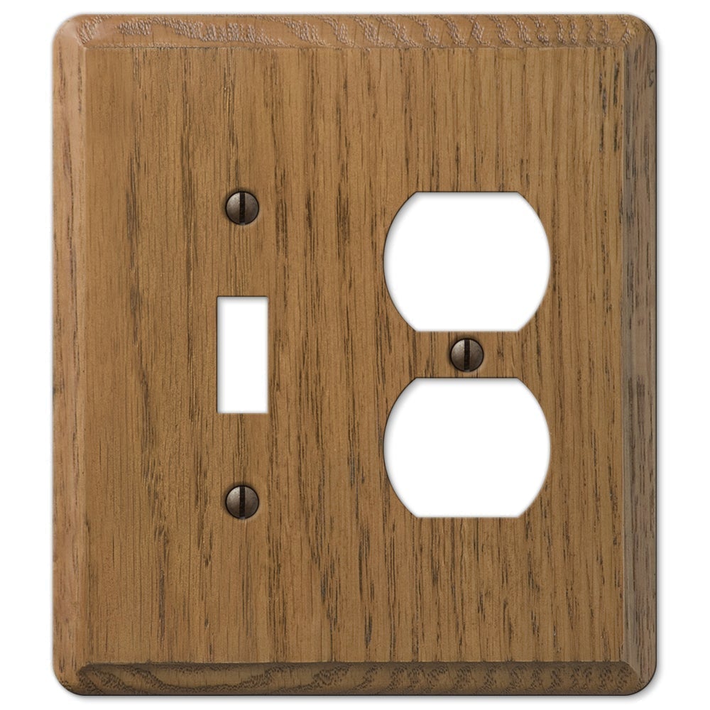 medium oak light switch and outlet wallplate featuring a rich, natural wood grain finish in a warm, medium-brown tone. The smooth surface and distinct texture bring a sense of warmth and sophistication, making it a versatile choice for both traditional and rustic interiors