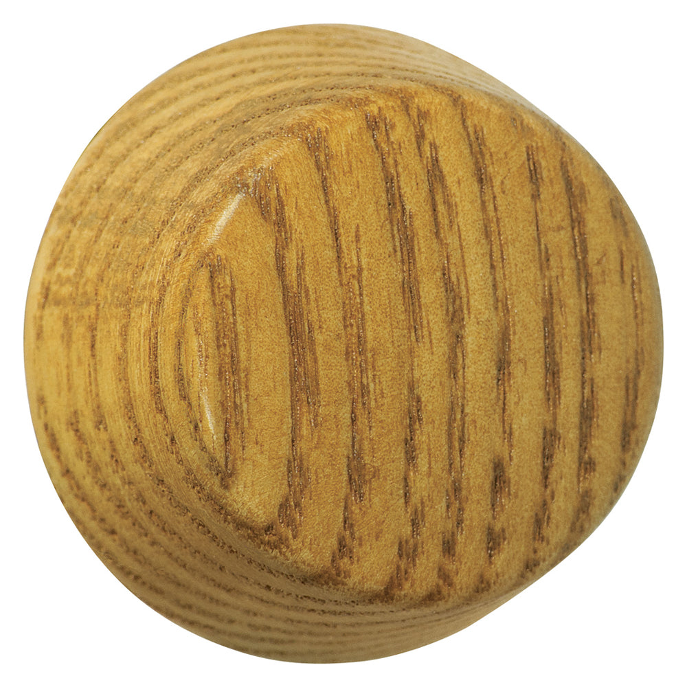 Close-up view of a light oak dimmer knob with a natural, warm appearance. The knob features a smooth, polished wood surface with subtle grain patterns, giving it a rustic yet refined look.