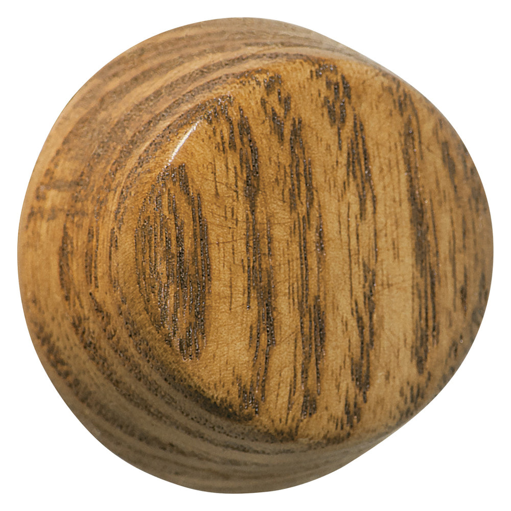 Close-up view of a medium oak dimmer knob with a natural, warm appearance. The knob features a smooth, polished wood surface with subtle grain patterns, giving it a rustic yet refined look.