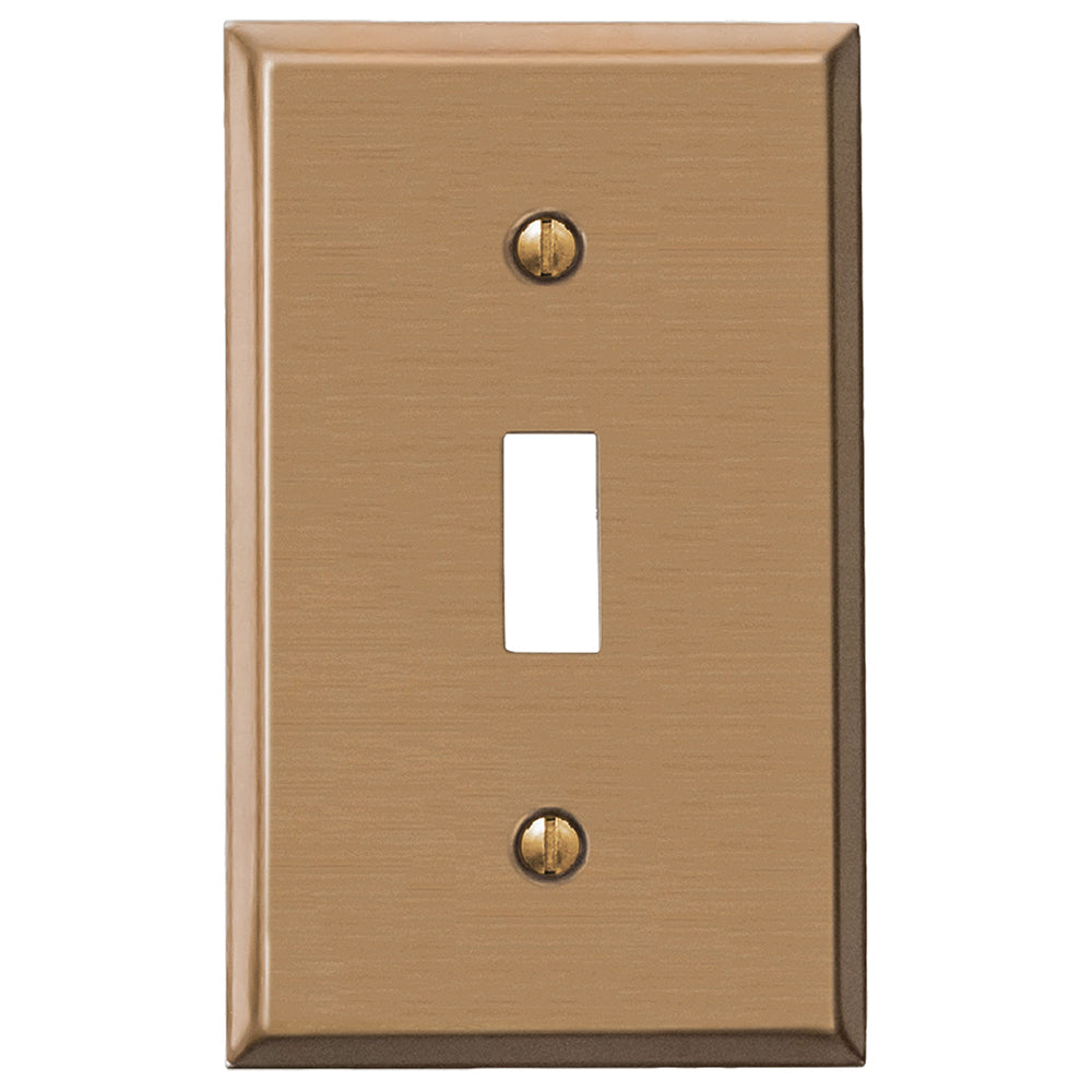 Close-up view of a brushed bronze light switch cover with a sleek, matte finish. The cover features a subtle brushed texture, adding a sophisticated, vintage touch.