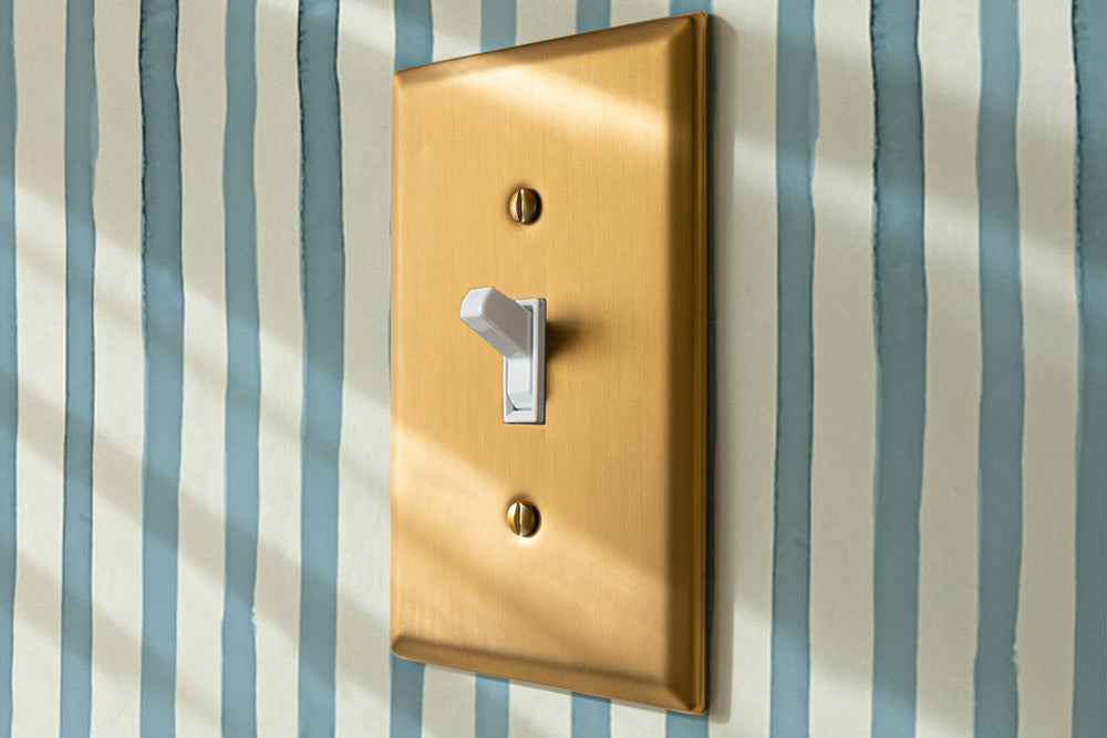 Oxford-Brushed-Gold-Wallplate-Installed-Coastal-Home.jpg__PID:5e02e4c5-4553-4b8a-bb70-5e6d55f2b6a2