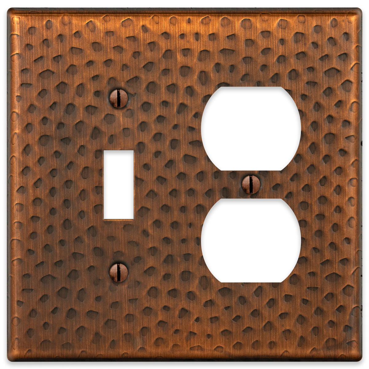 A hammered aged copper light switch and outlet wallplate featuring a textured surface with a warm, rustic copper finish, adding character and artisanal charm to traditional or farmhouse-style spaces.