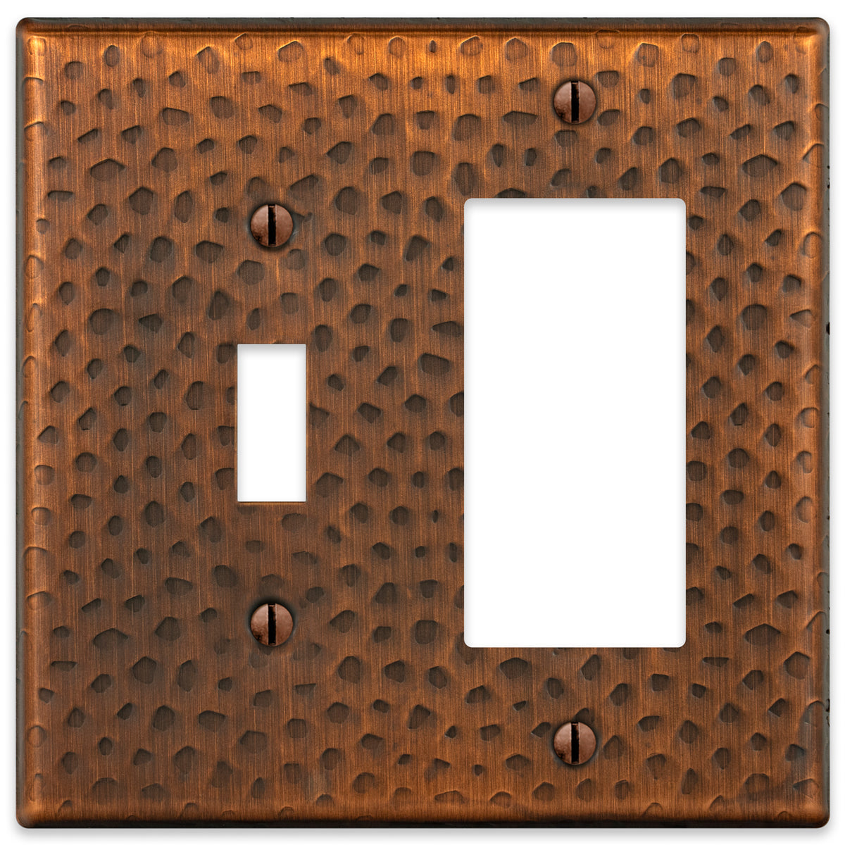 A hammered aged copper light switch and dimmer wallplate featuring a textured surface with a warm, rustic copper finish, adding character and artisanal charm to traditional or farmhouse-style spaces.