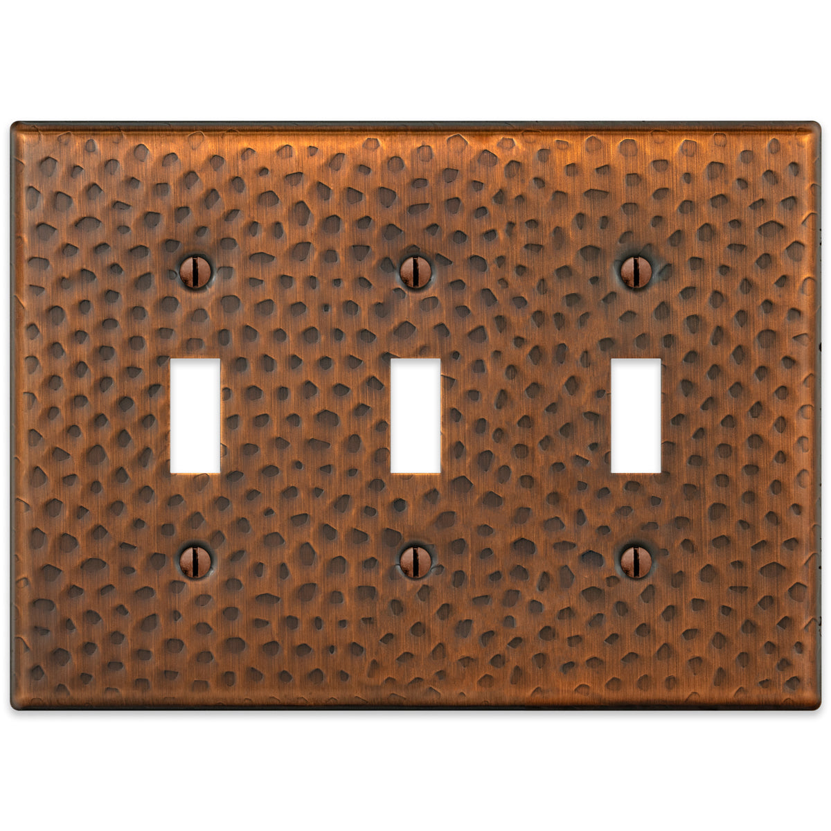 A hammered aged copper triple light switch cover featuring a textured surface with a warm, rustic copper finish, adding character and artisanal charm to traditional or farmhouse-style spaces.