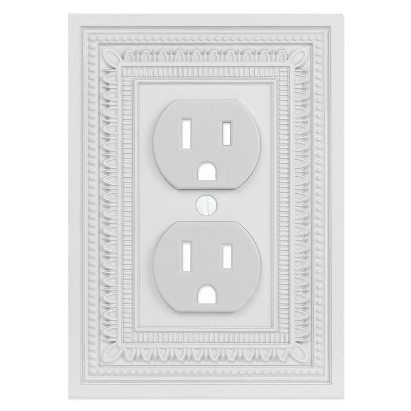 Filigree border matte white outlet wallplate with an intricate border design and a sleek, modern white finish, offering a sophisticated and timeless accent to any room.