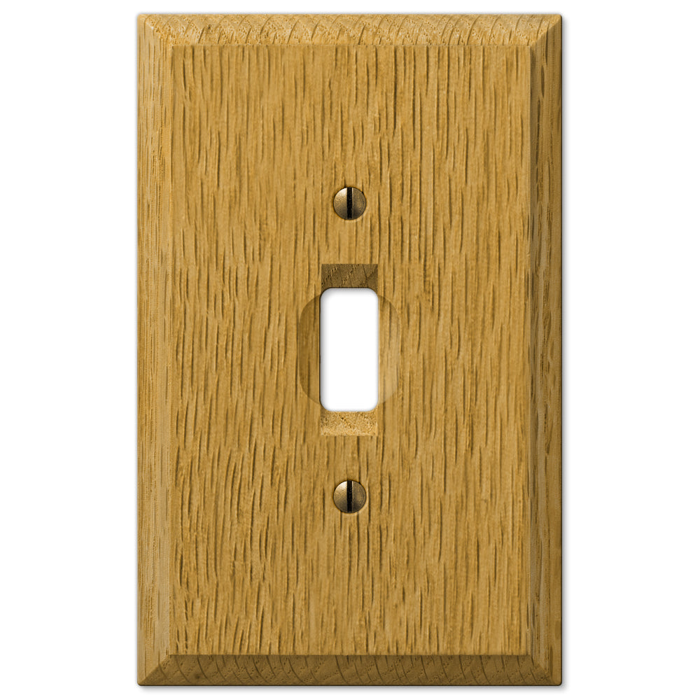 Light switch cover made of natural oak wood with a smooth, polished surface and visible wood grain, offering a warm, classic look to complement traditional or rustic interiors