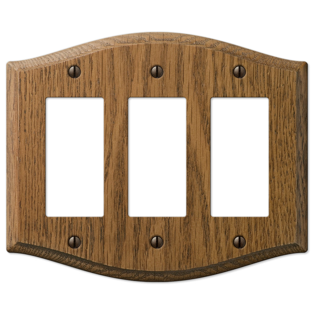 Country-style medium oak triple dimmer wallplate with a warm, natural wood grain and slightly weathered finish. The rustic charm and cozy, lived-in feel make it an ideal accent for country, farmhouse, and vintage-inspired decor styles.