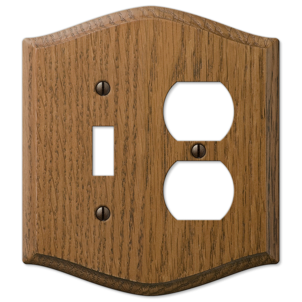 Country-style medium oak light switch and outlet wallplate with a warm, natural wood grain and slightly weathered finish. The rustic charm and cozy, lived-in feel make it an ideal accent for country, farmhouse, and vintage-inspired decor styles.