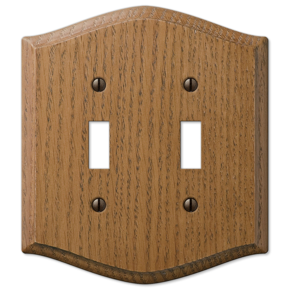 Country-style medium oak double light switch wallplate with a warm, natural wood grain and slightly weathered finish. The rustic charm and cozy, lived-in feel make it an ideal accent for country, farmhouse, and vintage-inspired decor styles.