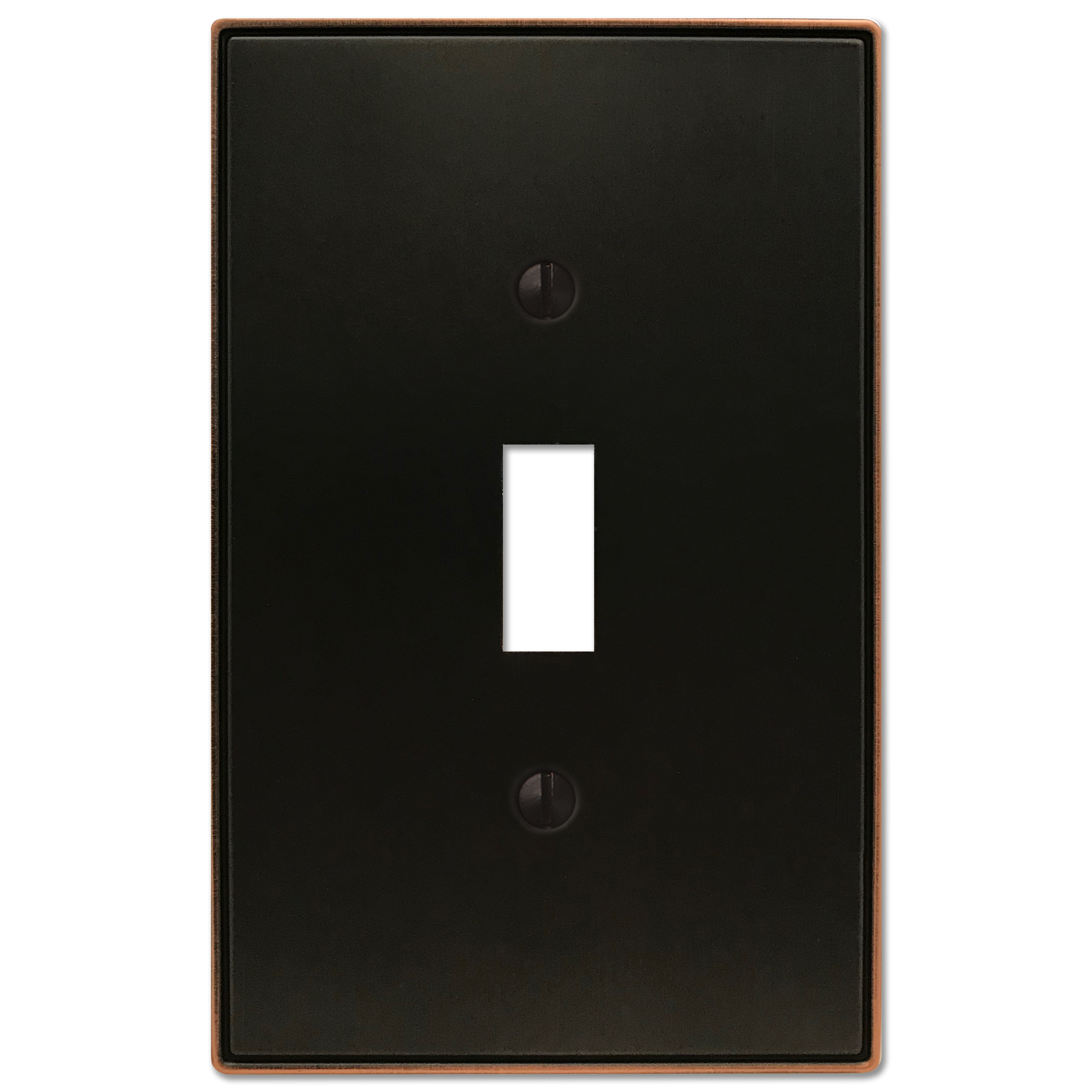 The Halle aged bronze light switch cover features a sophisticated design with smooth edges and a warm, dark bronze finish, perfect for adding a subtle touch of classic charm to traditional or transitional spaces.