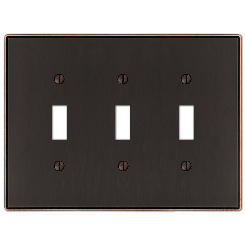 The Halle aged bronze triple light switch cover features a sophisticated design with smooth edges and a warm, dark bronze finish, perfect for adding a subtle touch of classic charm to traditional or transitional spaces.