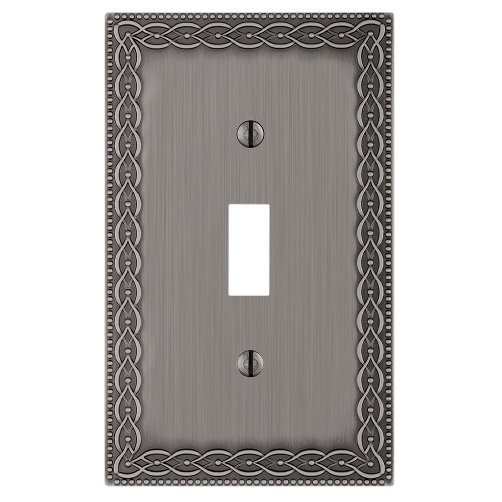 Antique nickel light switch cover featuring a brushed metallic finish with a vintage, decorative design, adding an elegant, timeless touch to the space.